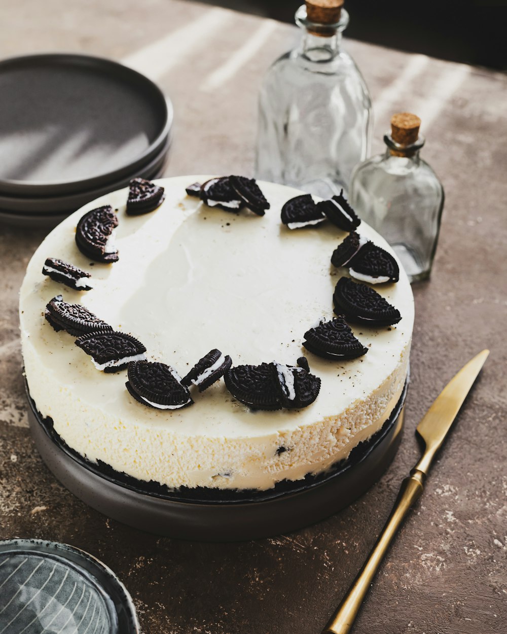 a cake sitting on top of a table next to a plate