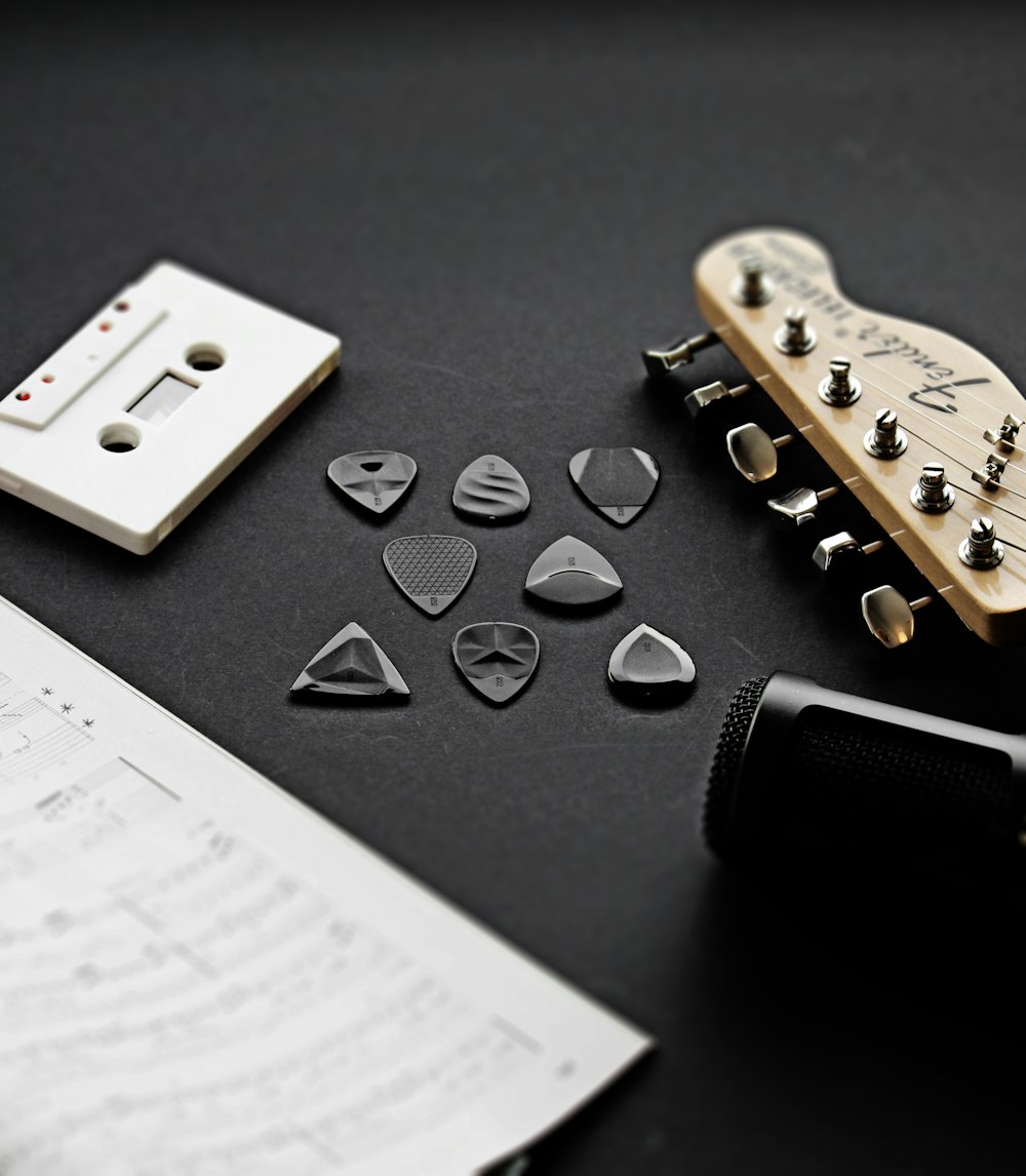 a guitar and other musical instruments on a table