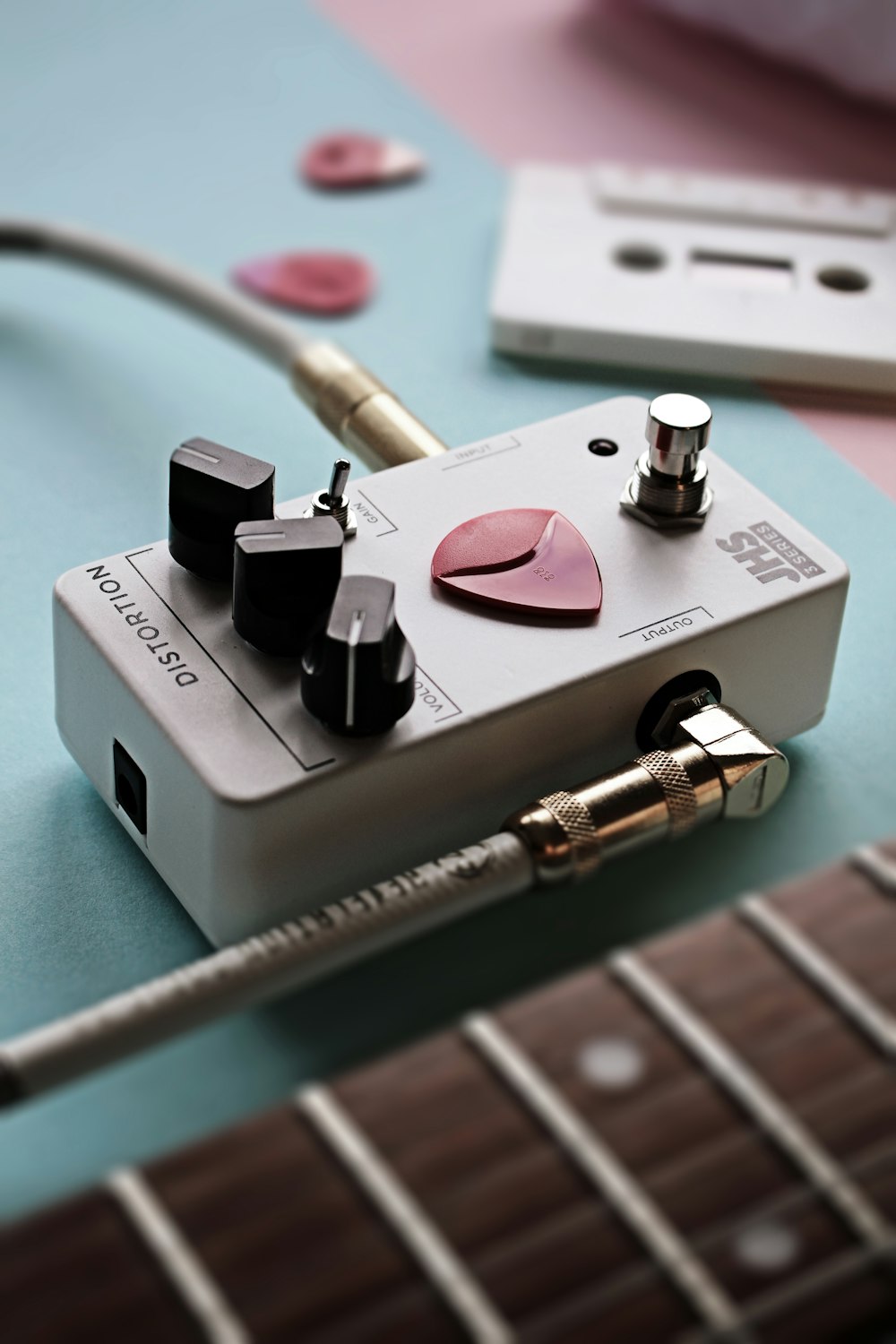 a close up of a guitar pedal on a table