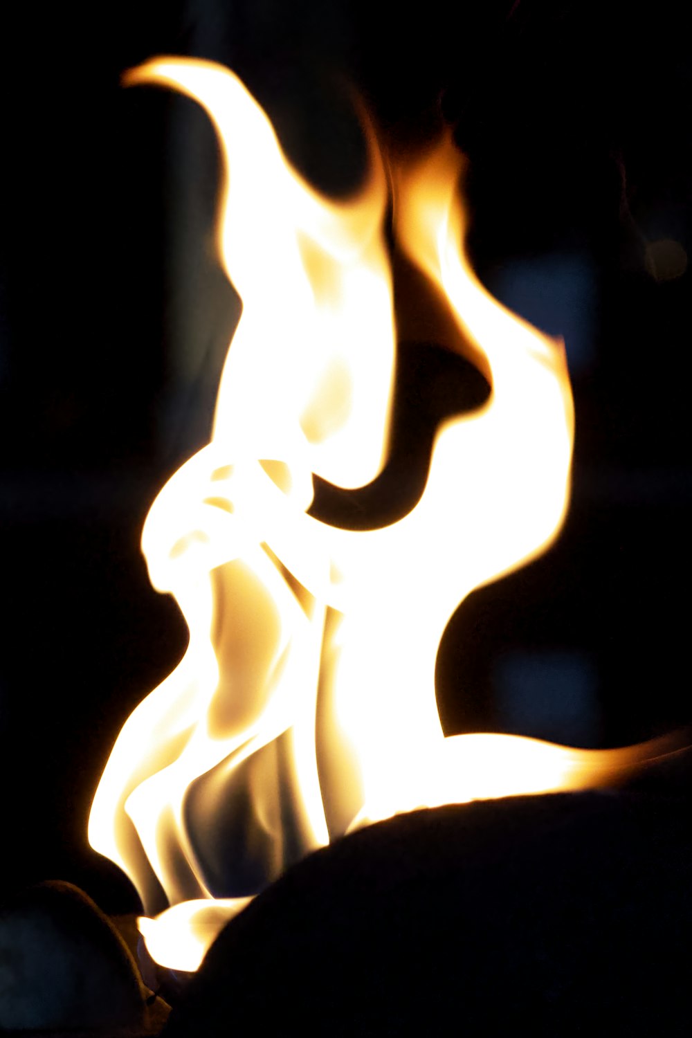 a close up of a fire on a black background