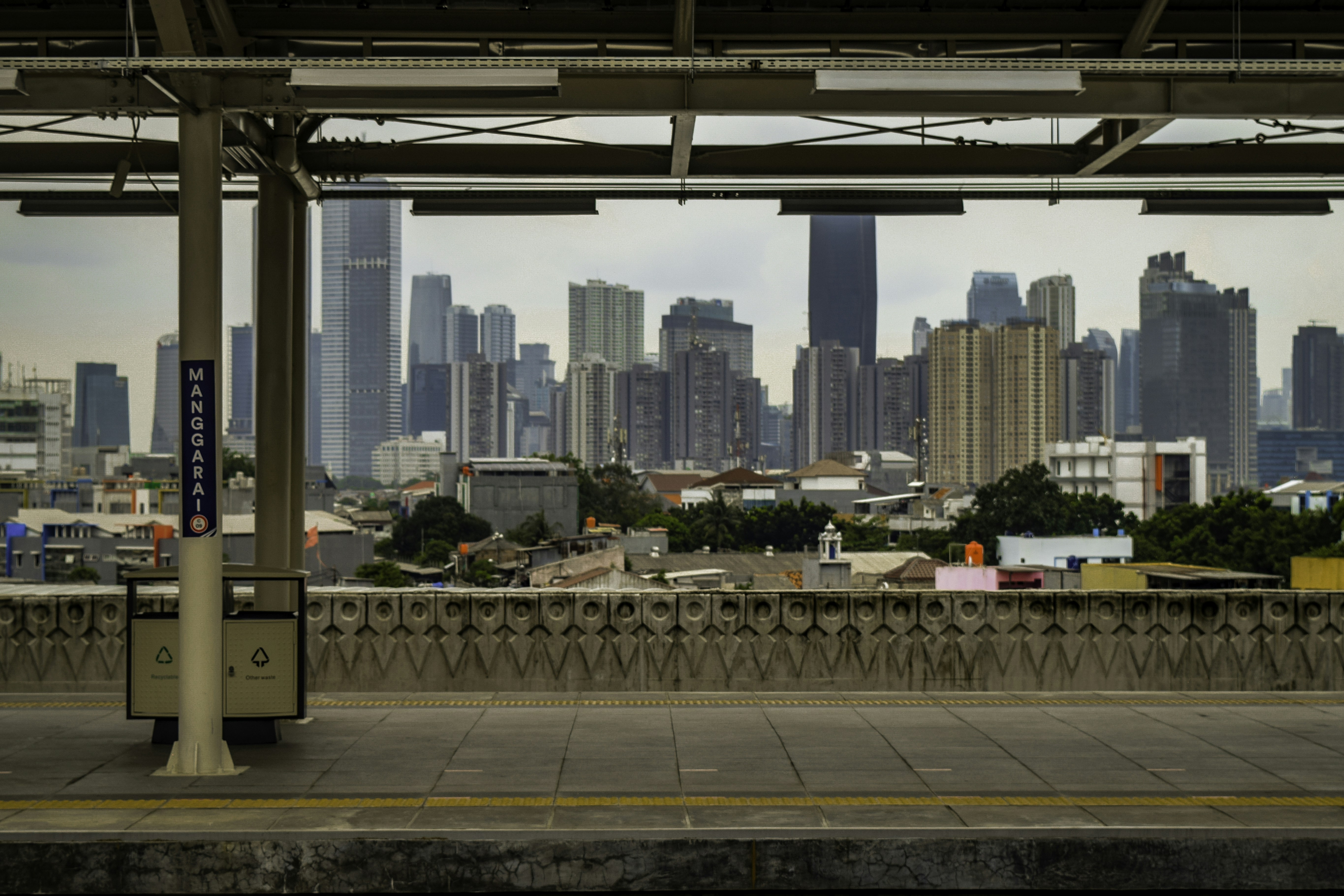 a view of a city from a train station