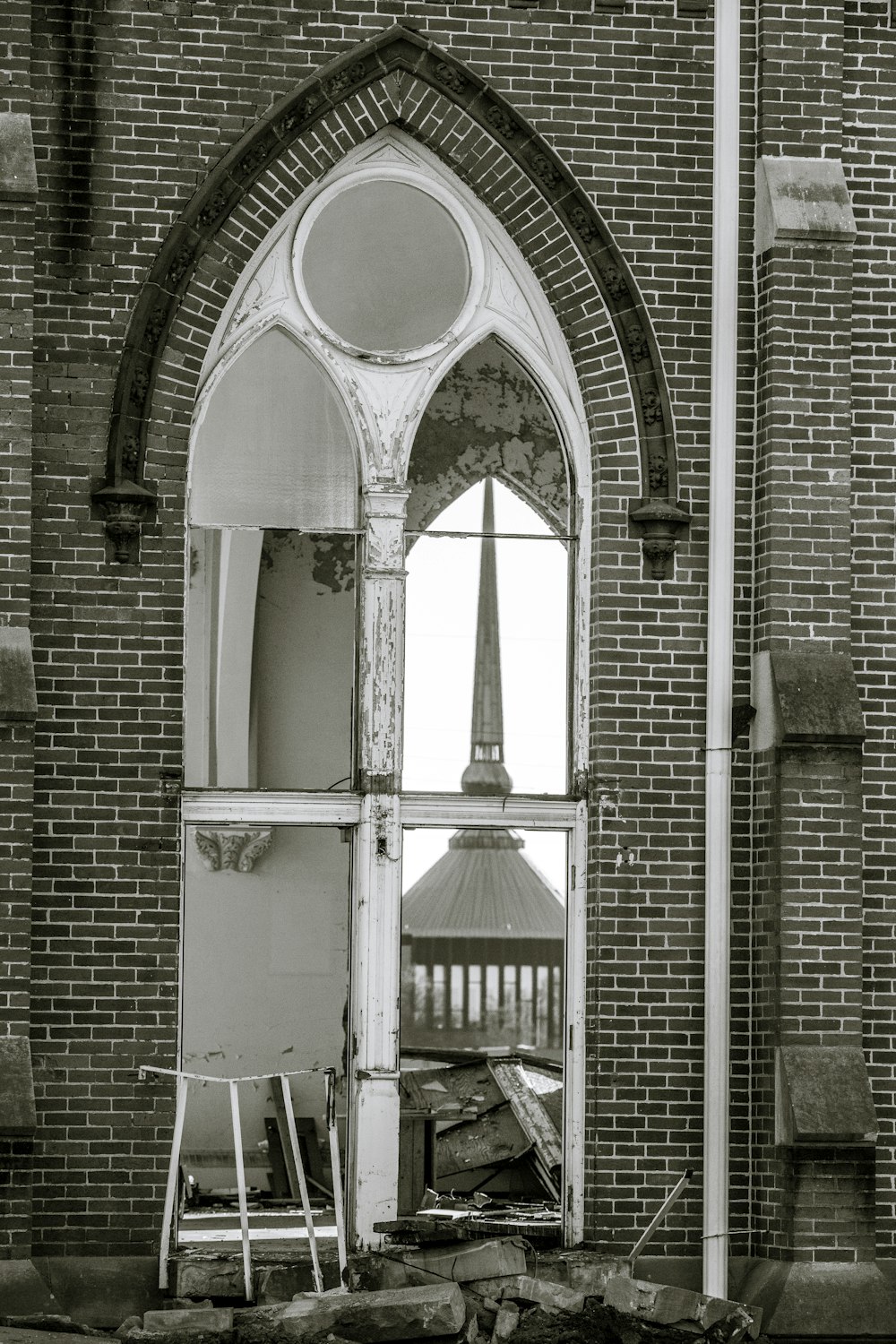 an old building with a clock tower in the window