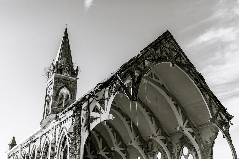 a black and white photo of an old church