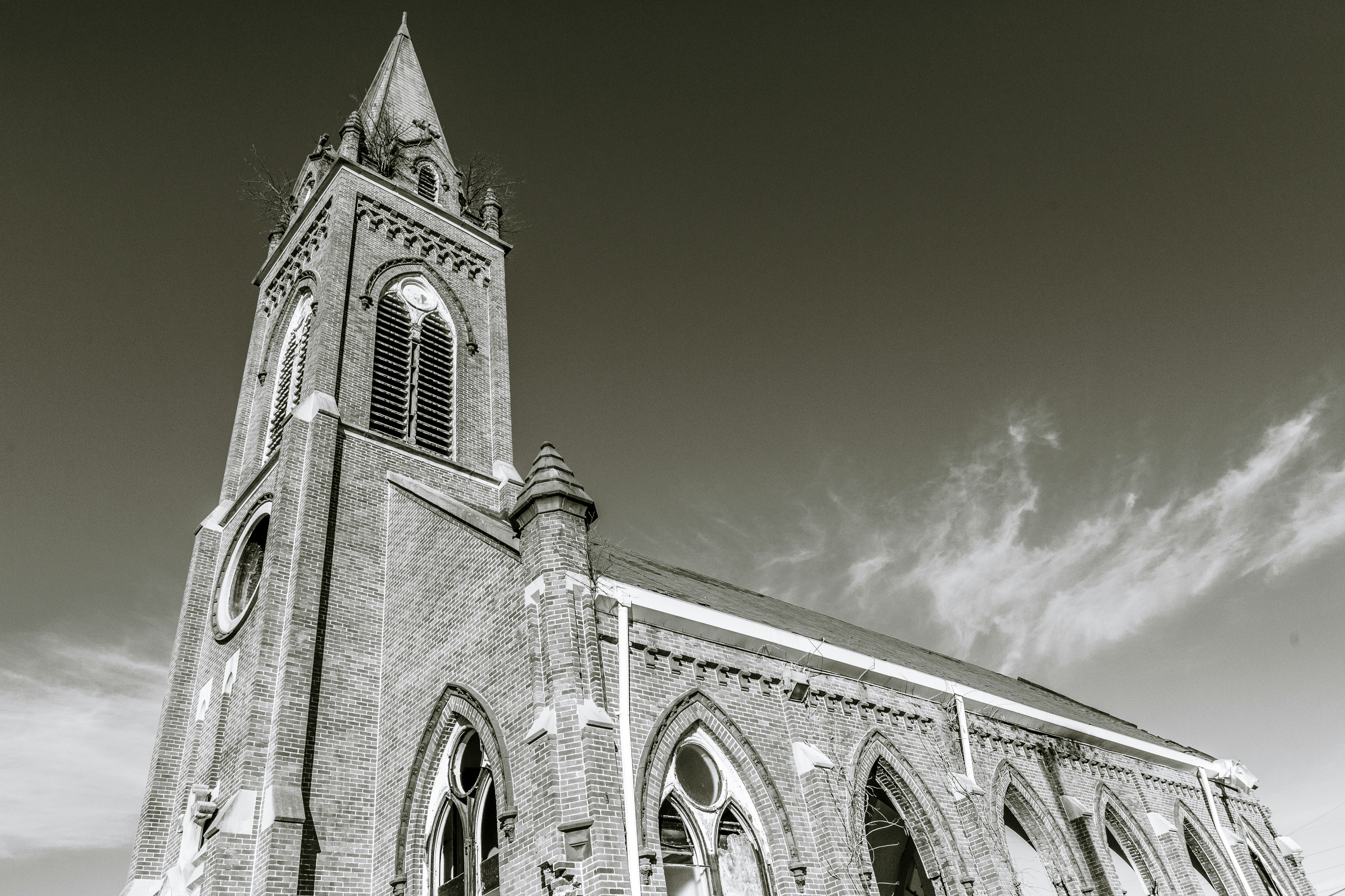 a black and white photo of a church