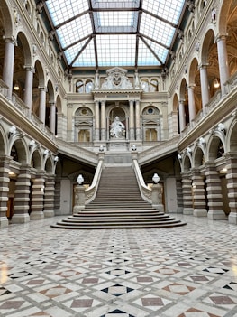a large building with a staircase and a skylight