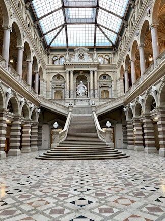a large building with a staircase and a skylight