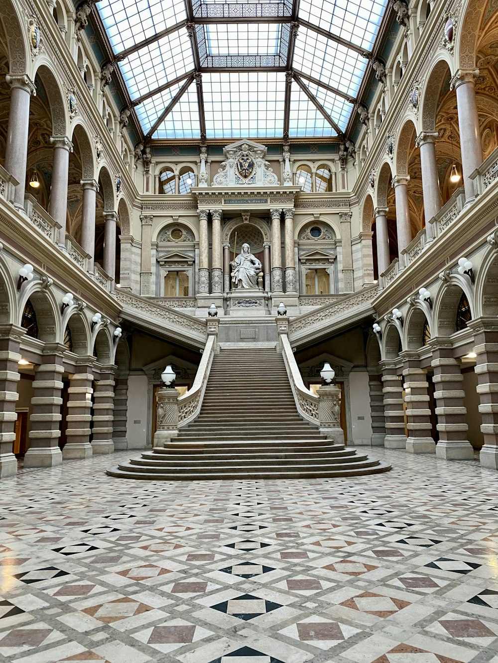 a large building with a staircase and a skylight