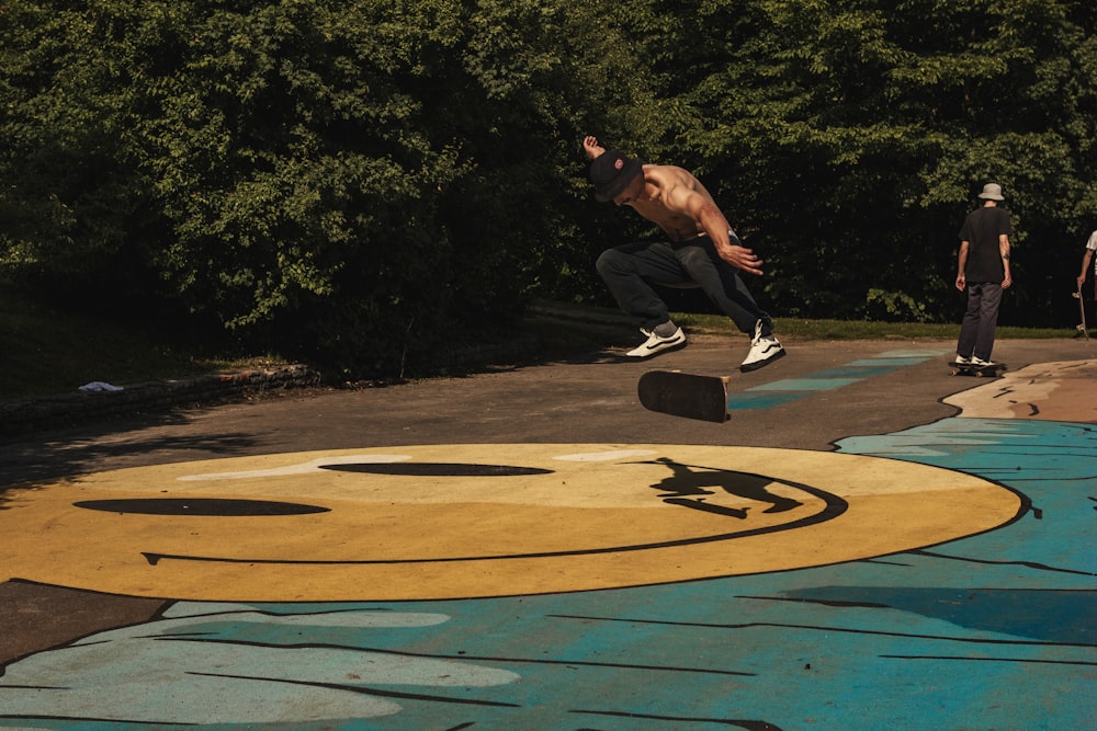 a man flying through the air while riding a skateboard