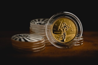 a stack of coins sitting on top of a table