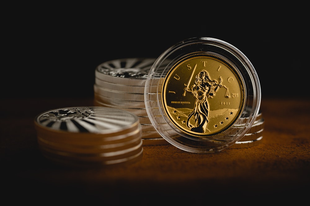 a stack of coins sitting on top of a table