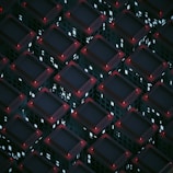 Architectural blueprint overlay on a dark background with glowing lines tracing apartment layouts.