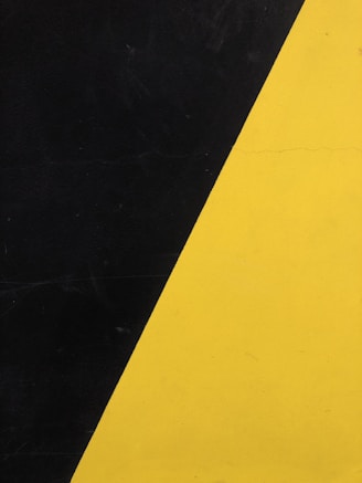 a close up of a yellow and black striped object