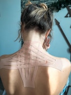 a woman with a tattoo on her back