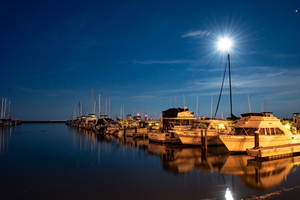 a group of boats that are sitting in the water