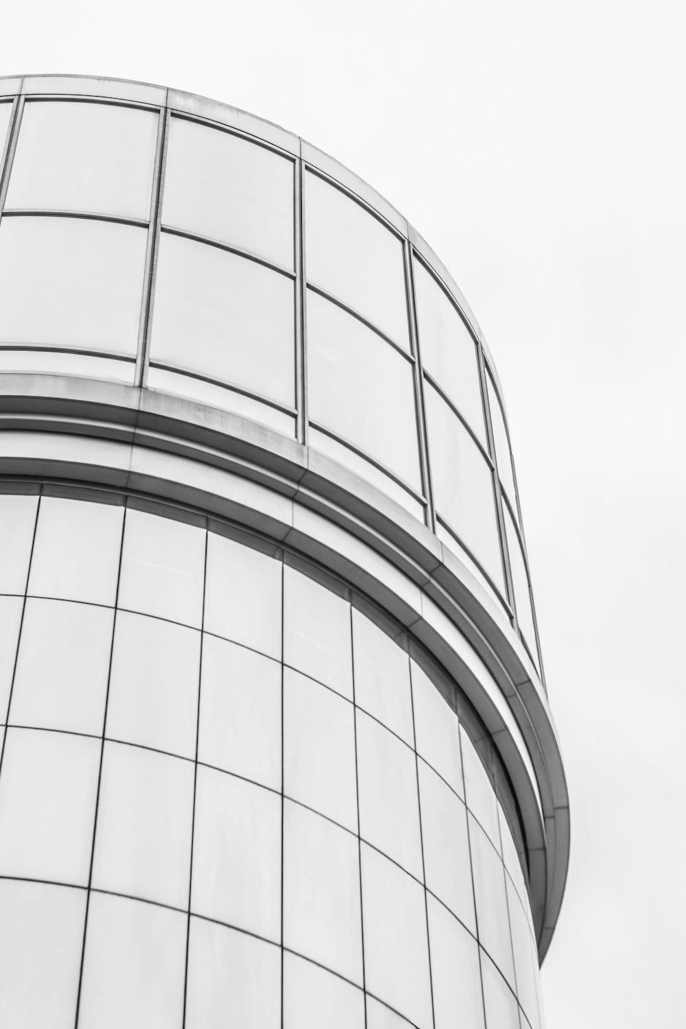 a black and white photo of a tall building