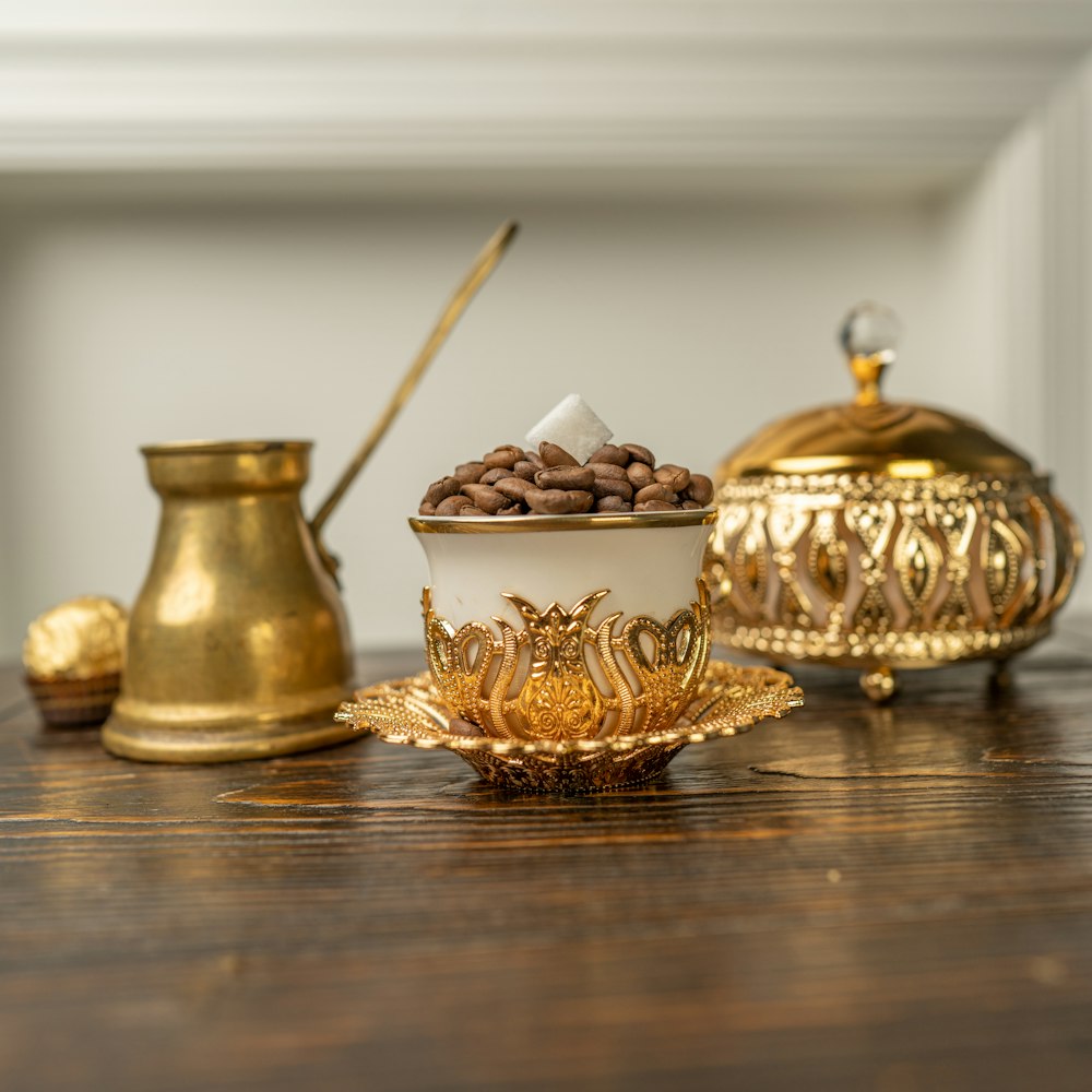 a wooden table topped with a bowl of food