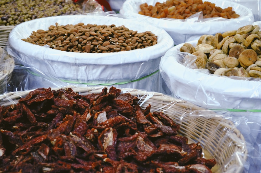 a variety of nuts and nutshells in baskets
