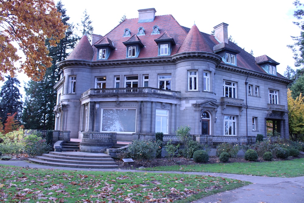 a large house with a lot of windows on the front of it