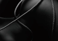 a black and white photo of a rope wrapped around an object