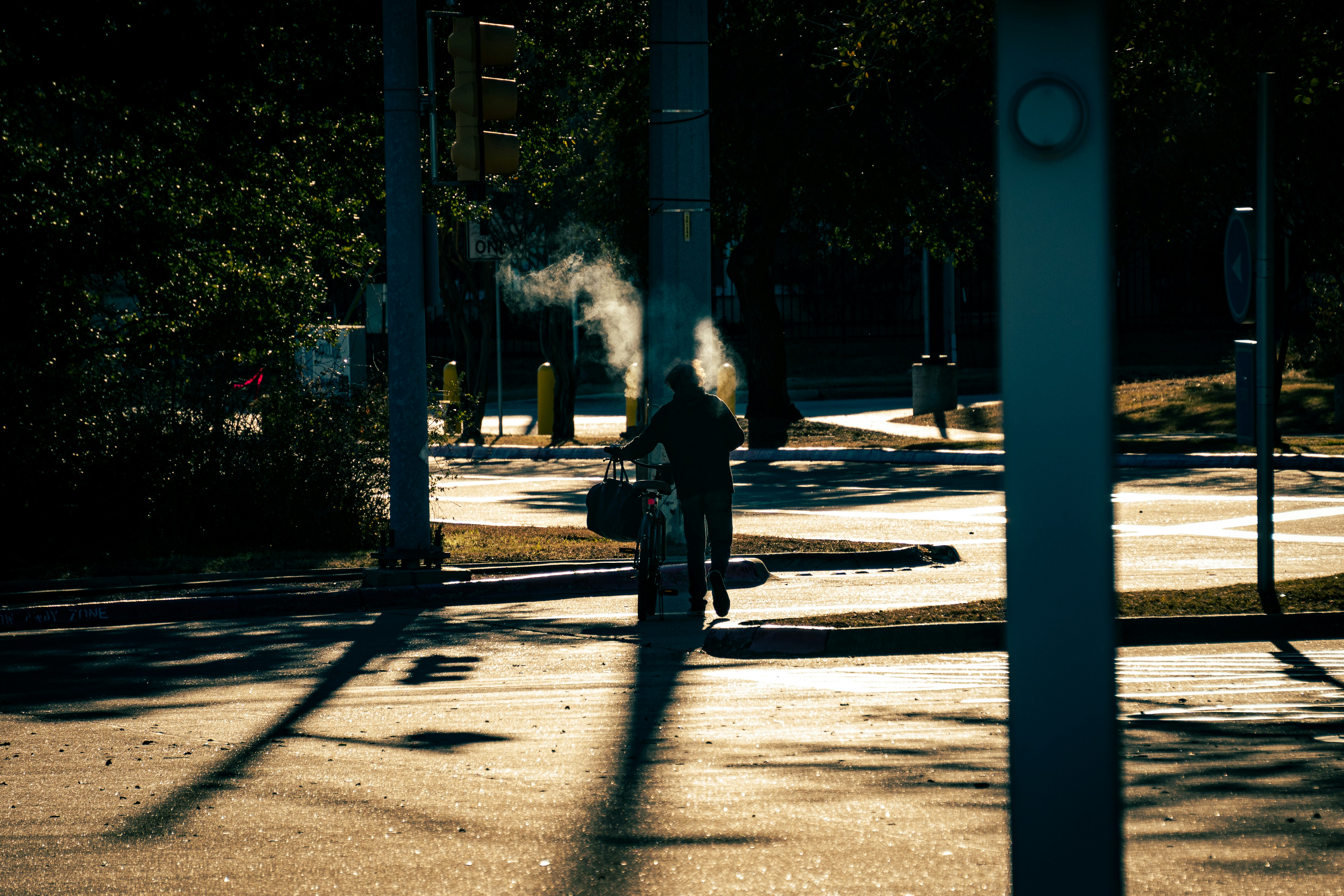 a person riding a motorcycle down a street