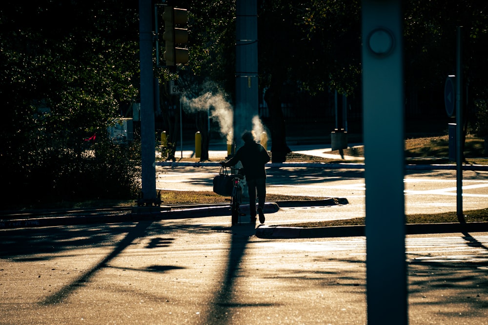 a person riding a motorcycle down a street