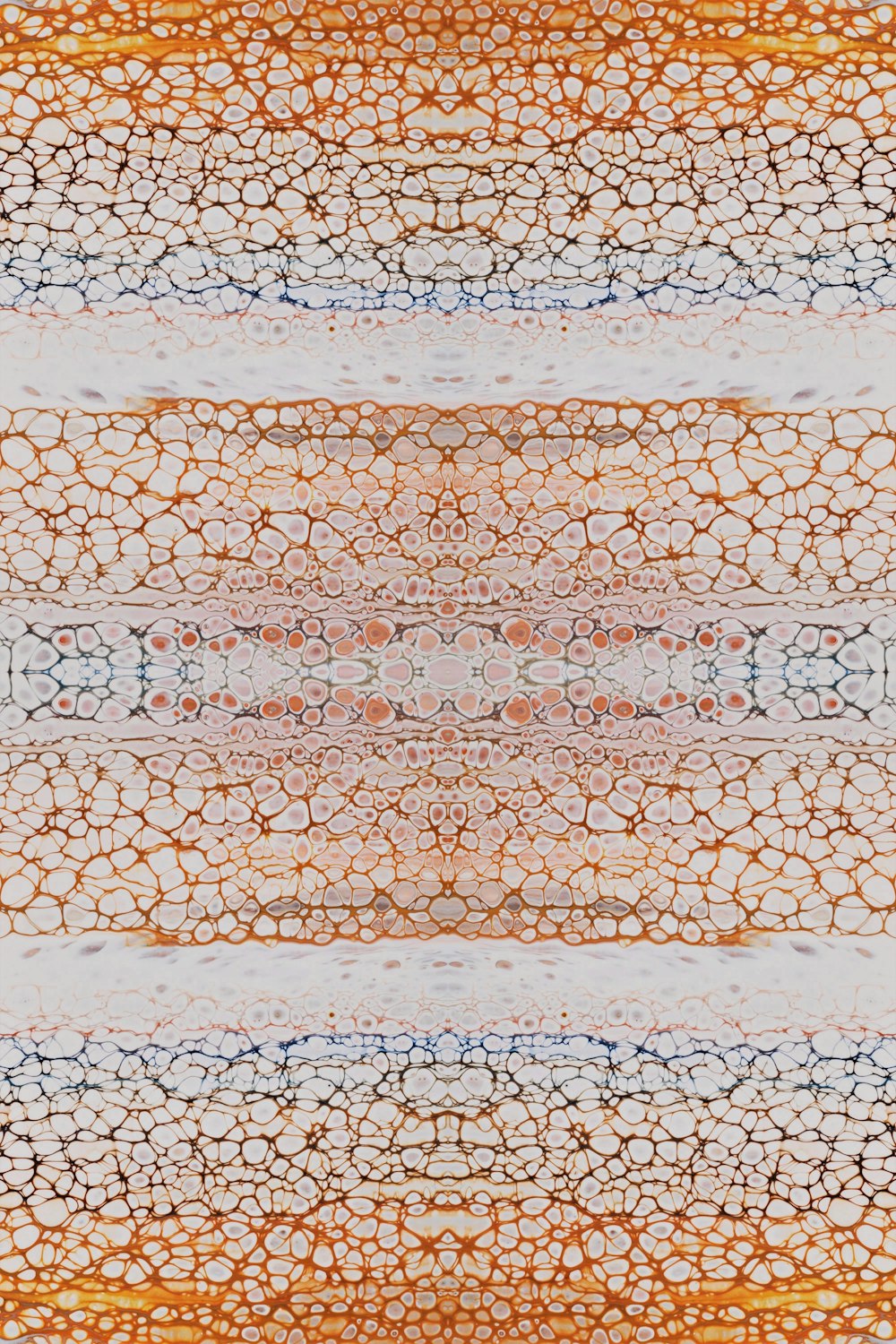 an abstract pattern of orange, blue, and white