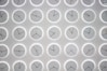 a white wall with many clocks on it