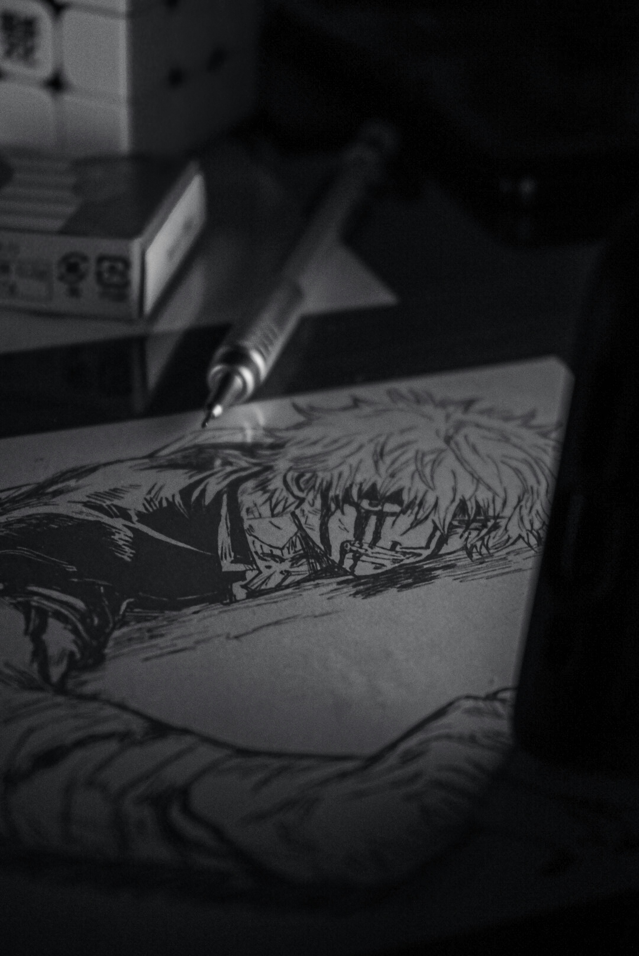 a pen sitting on top of a piece of paper