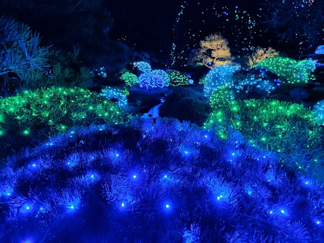 A vibrant Minecraft landscape glowing with magical mods and shimmering shaders.