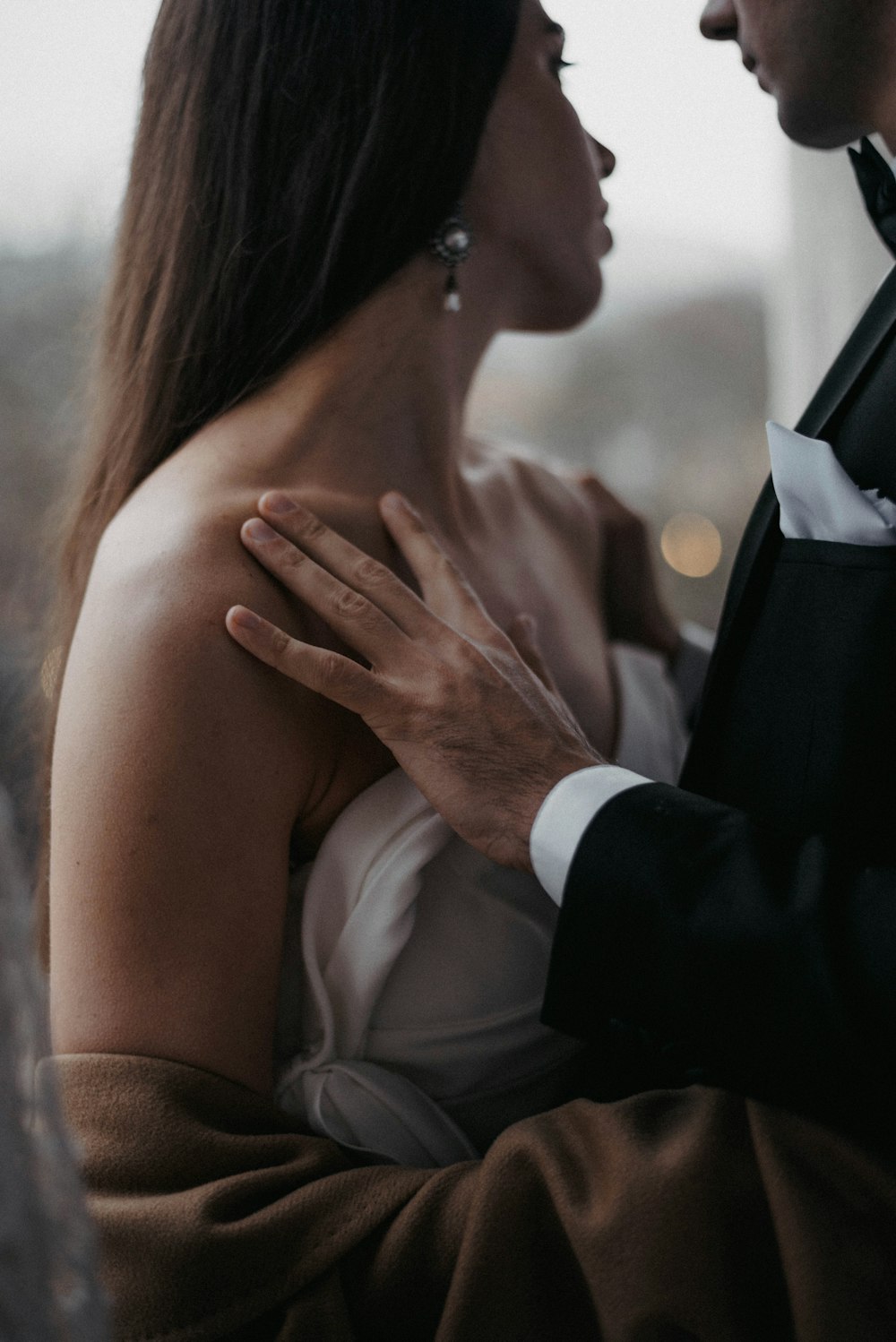 a man and a woman standing next to each other