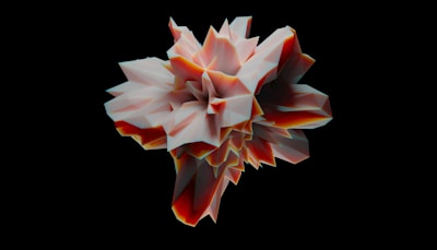 A geometric and abstract 3D shape with sharp, angular facets in a mix of light and dark tones, resembling a crystallized structure with a central convergence of points. The object is rendered in shades of red, white, and black, against a solid black background.