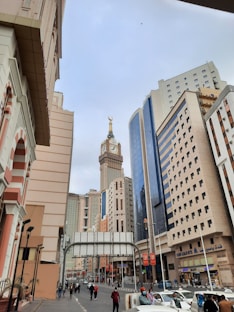 a city street filled with lots of tall buildings