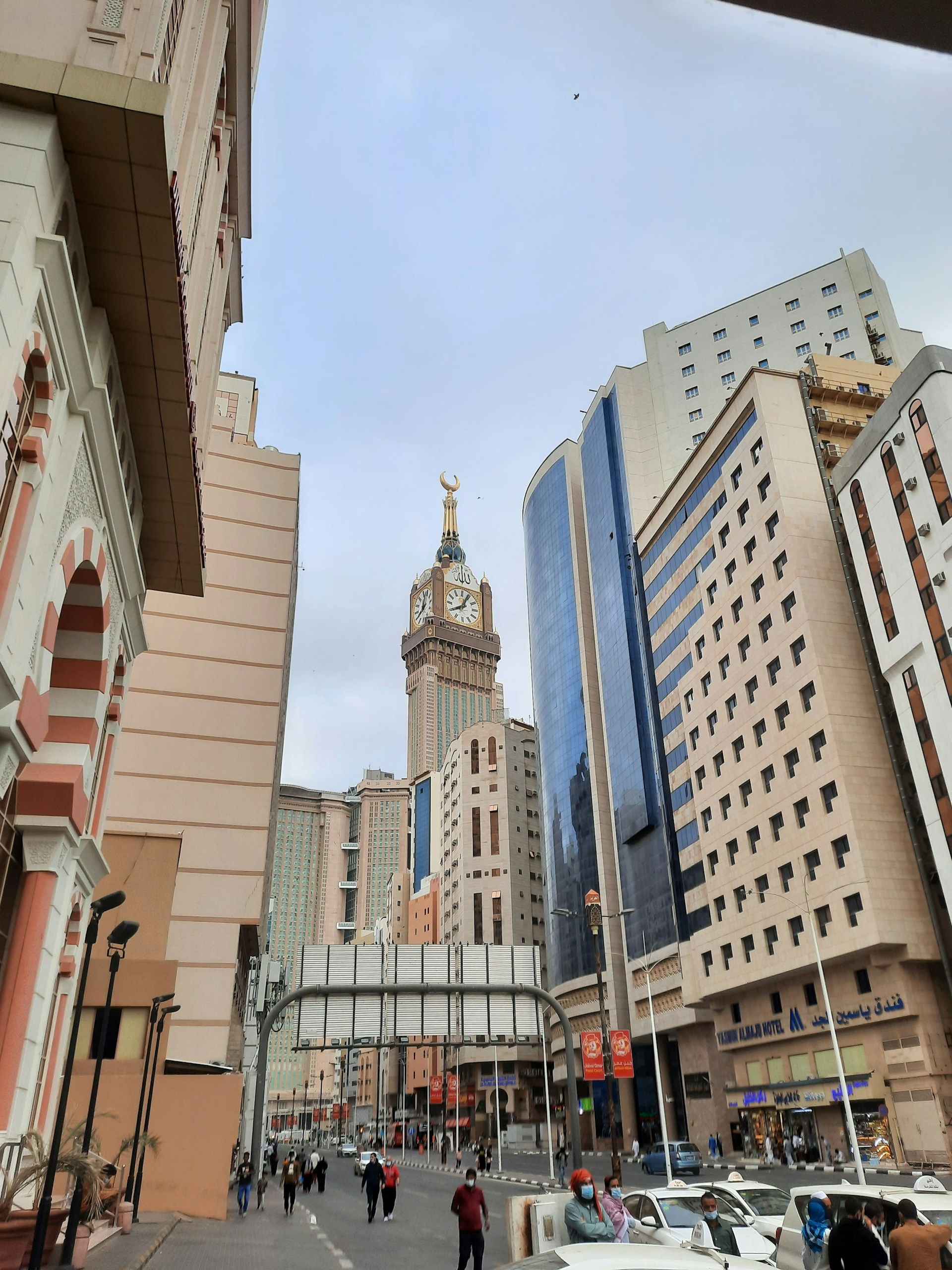 a city street filled with lots of tall buildings
