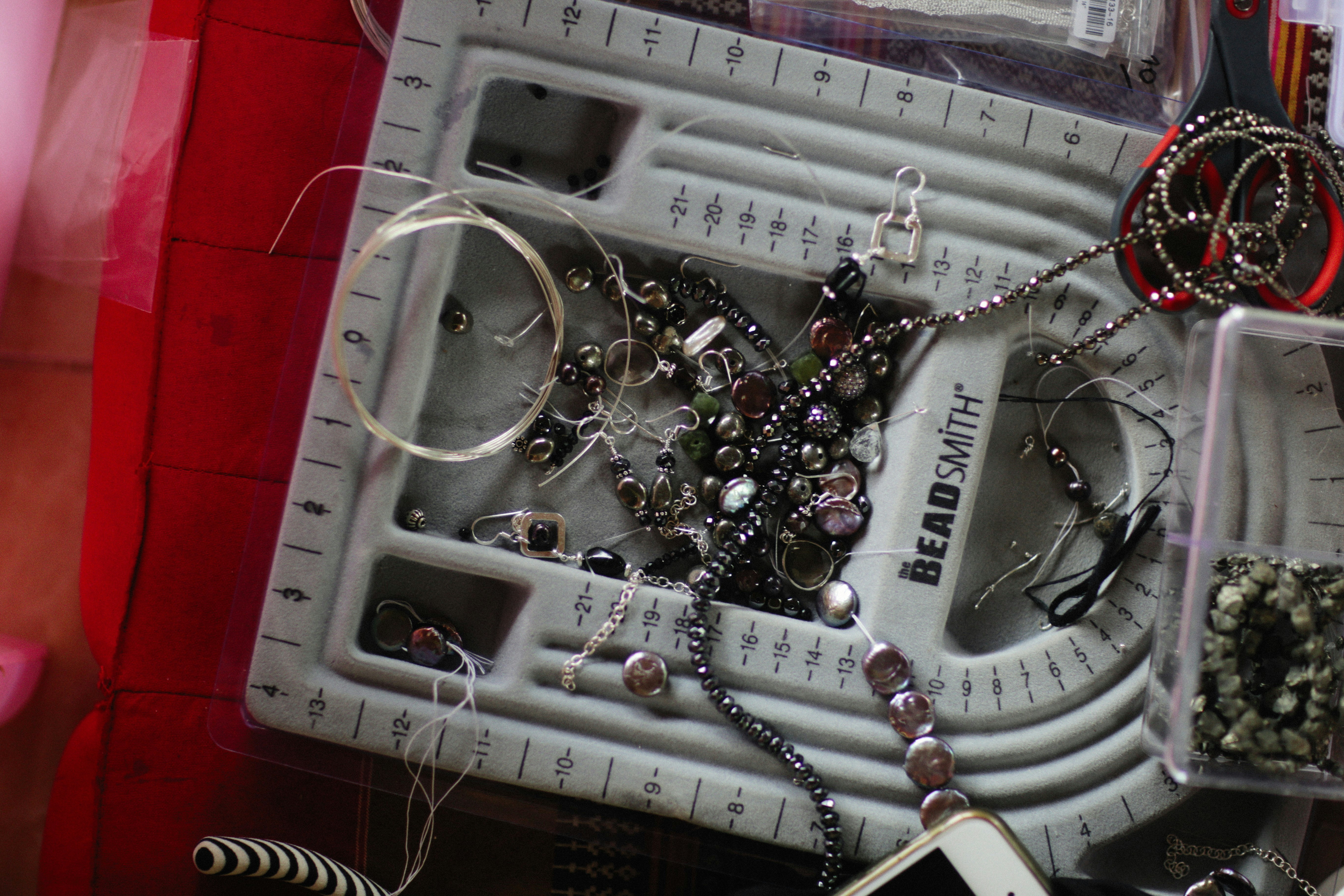 a bunch of jewelry sitting on top of a table