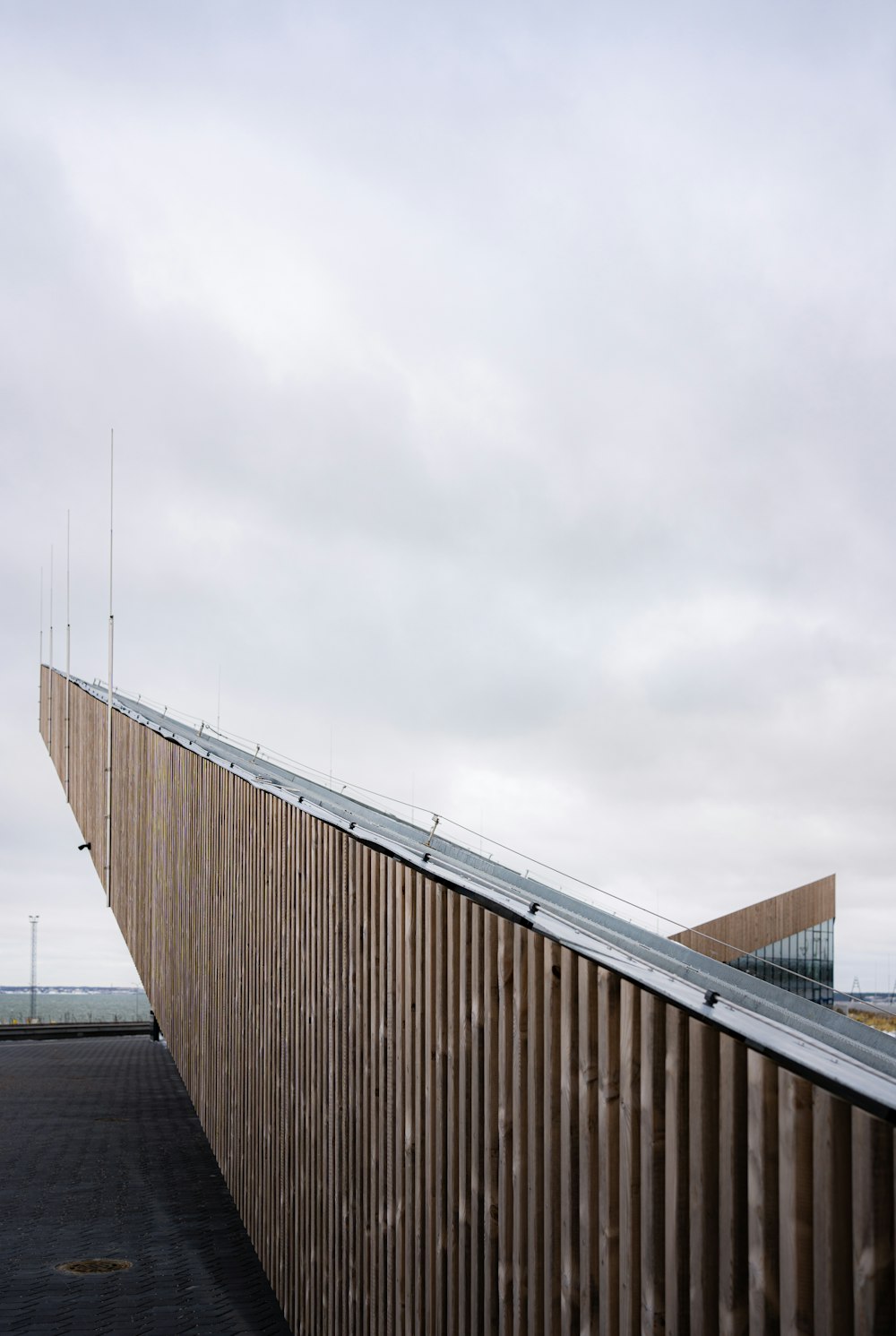 a very tall building with a very long roof