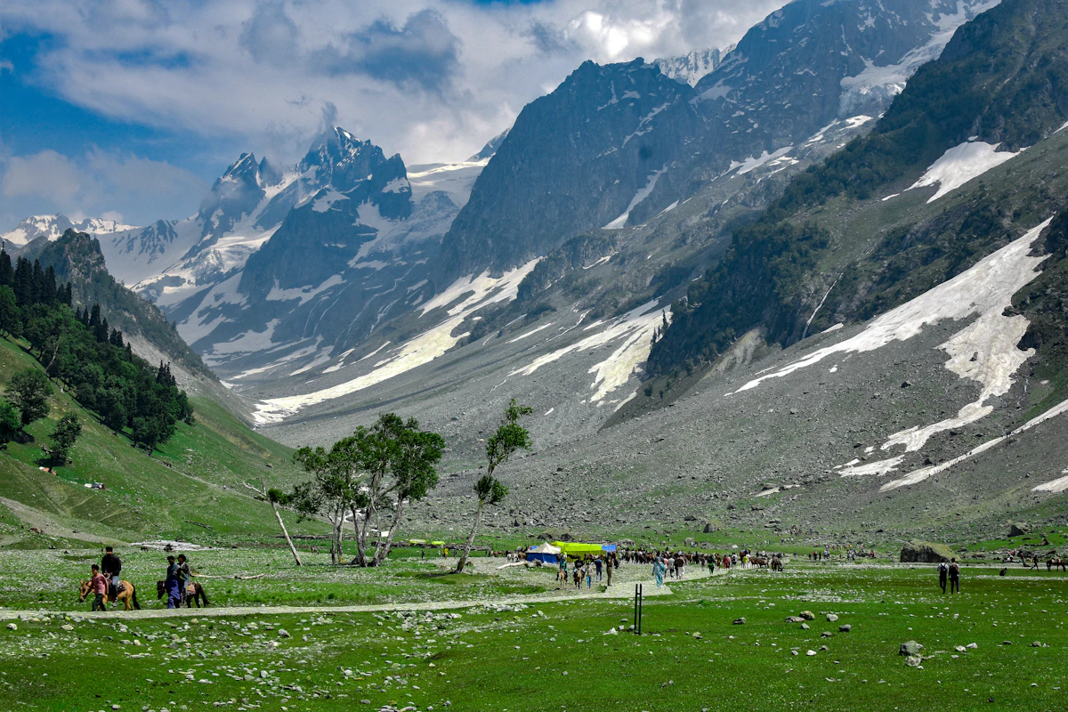 Dal Lake houseboats with Himalayan backdrop. Kashmir Valley Escape package
