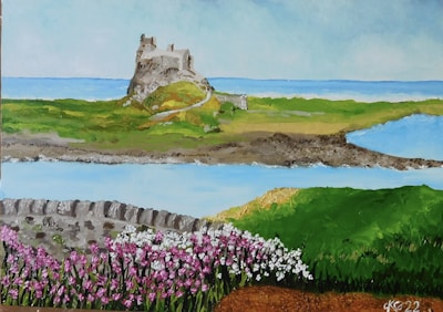 A scenic landscape painting features a distant castle on a lush green hill surrounded by a blue sea. In the foreground, there is a stone wall and vibrant wildflowers in shades of pink and white. The painting captures a tranquil coastal setting under a clear sky.
