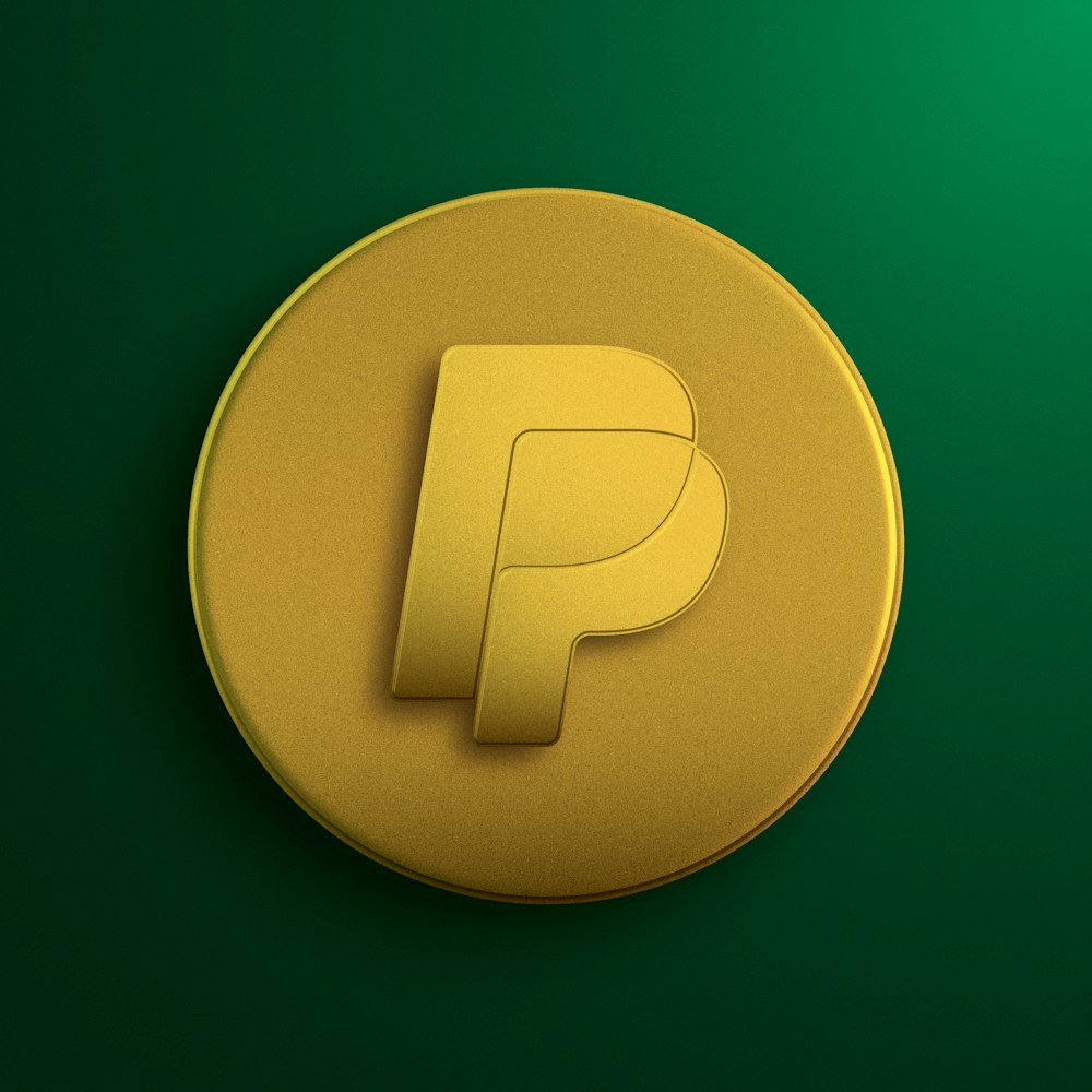 a yellow button with the letter p on it