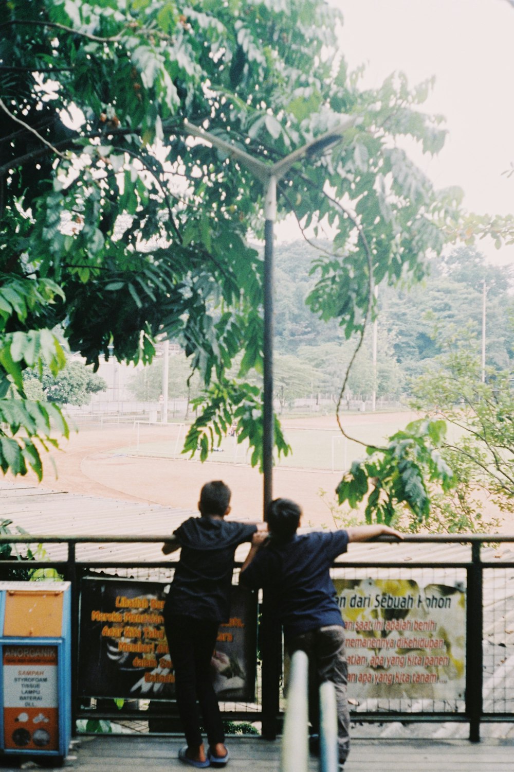 a couple of people standing next to each other