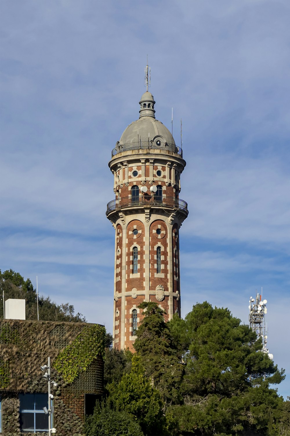 a tall tower with a clock on the top of it