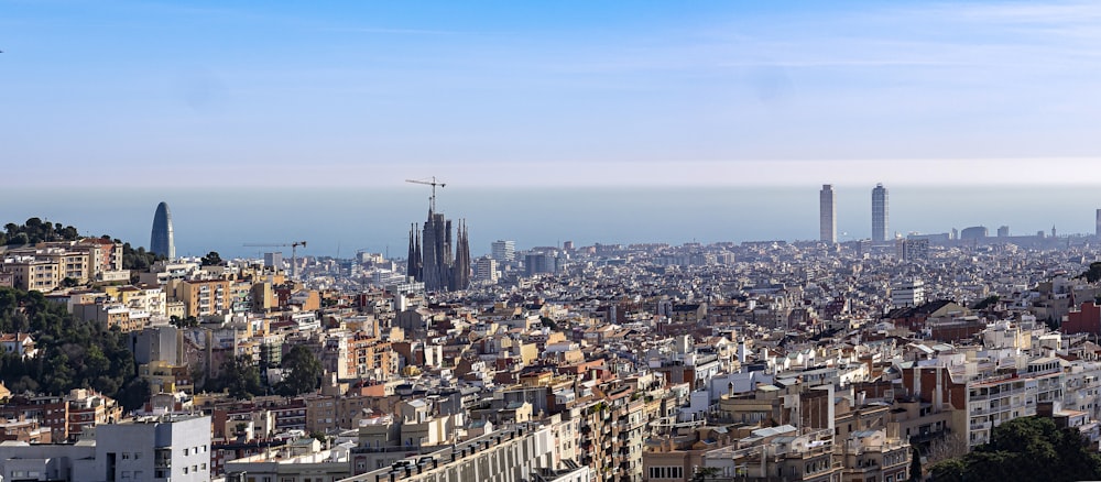 a view of the city of barcelona from the top of a hill