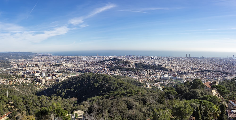 a view of a city from the top of a hill