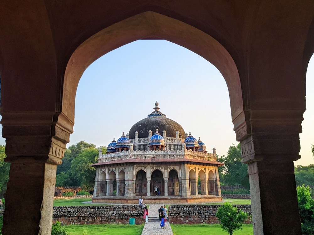 a view of a building through an archway