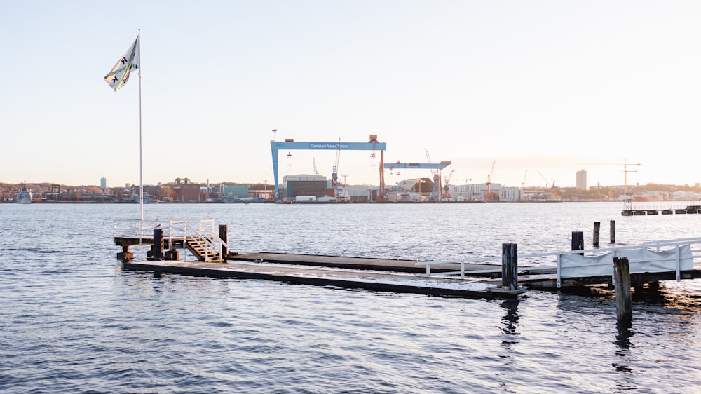 a large body of water next to a dock