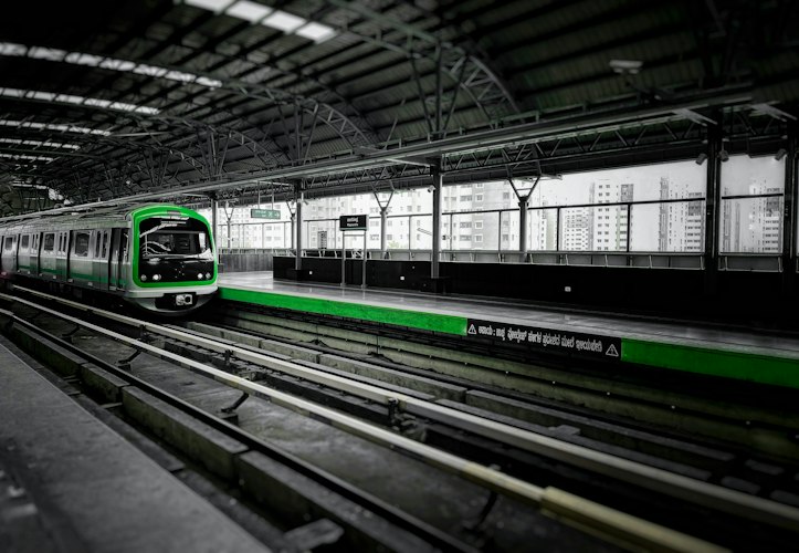 A driverless train arriving at a modern metro platform