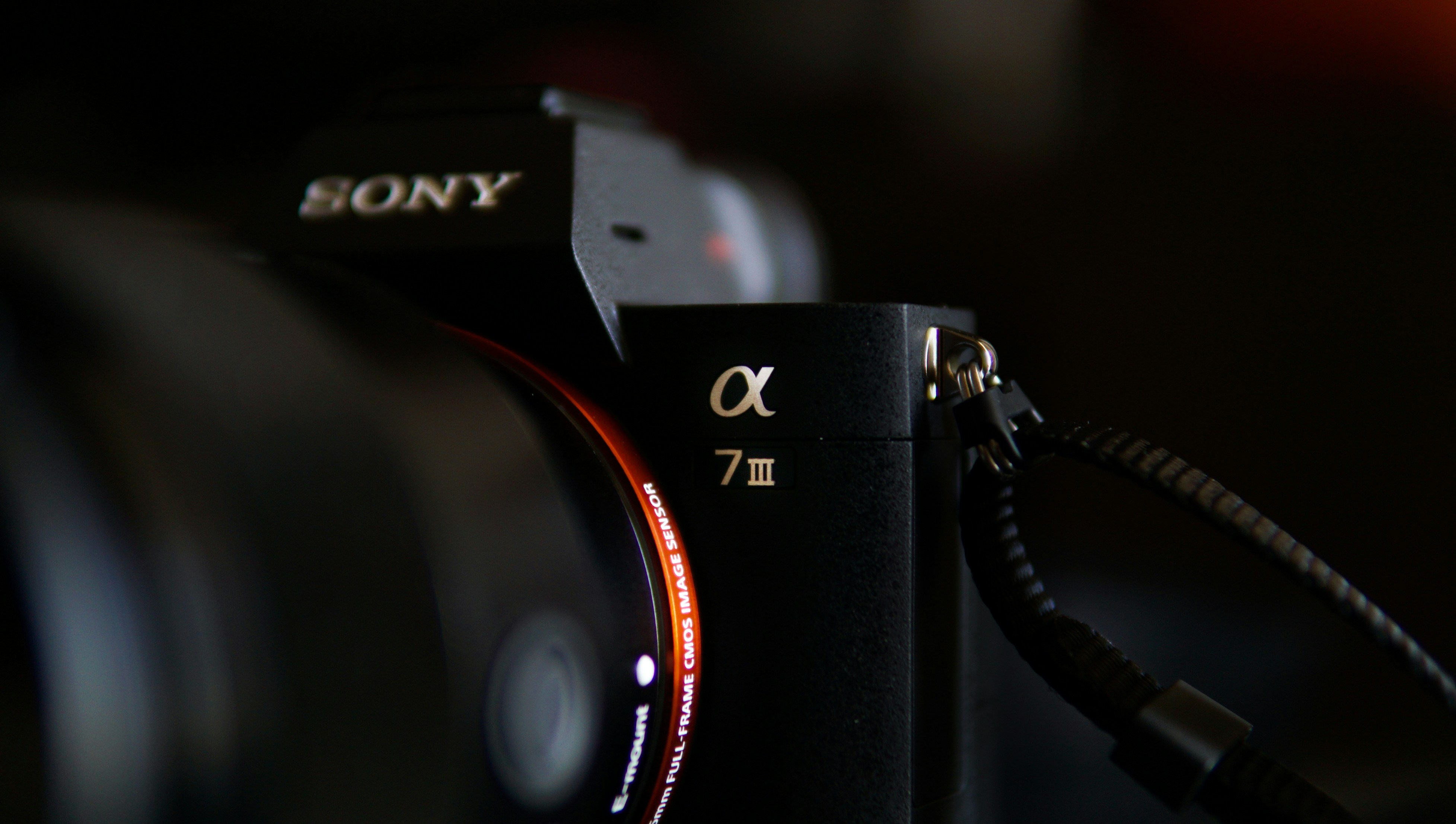 a close up of a camera with a lens attached to it