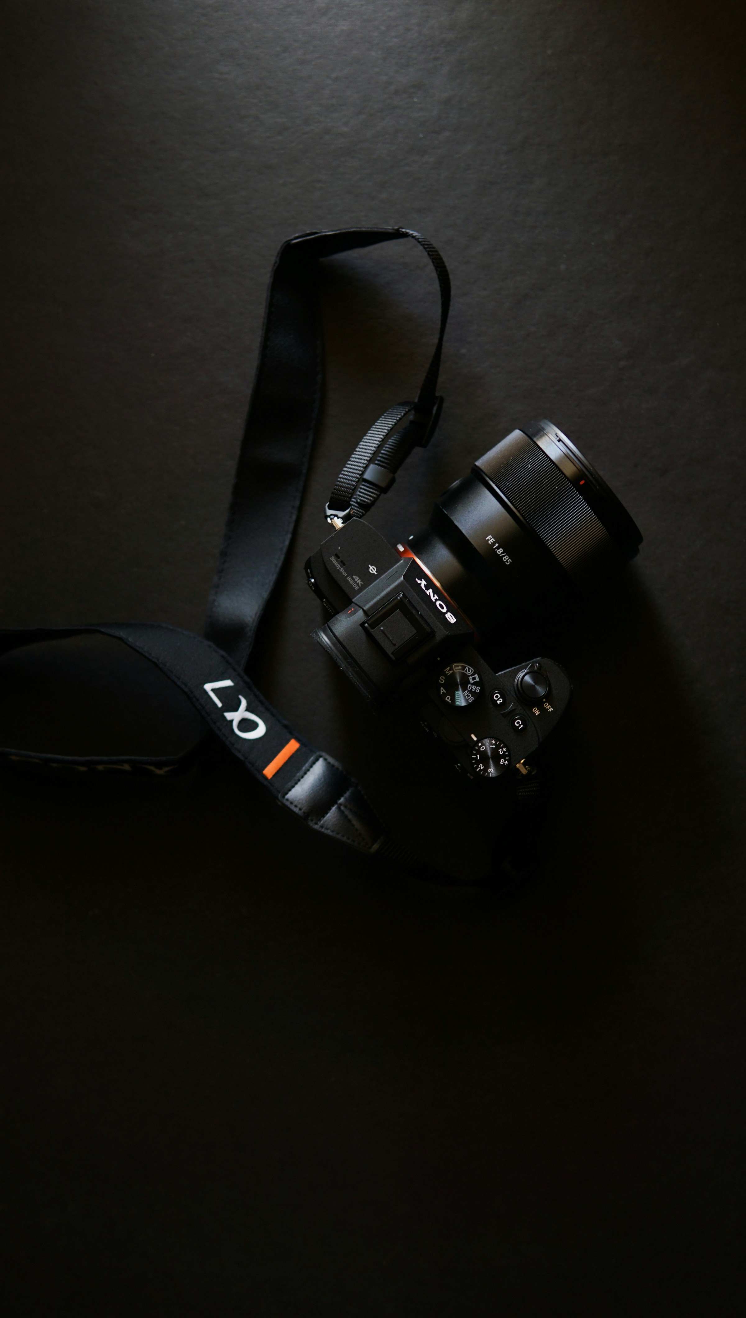 a camera sitting on top of a black table