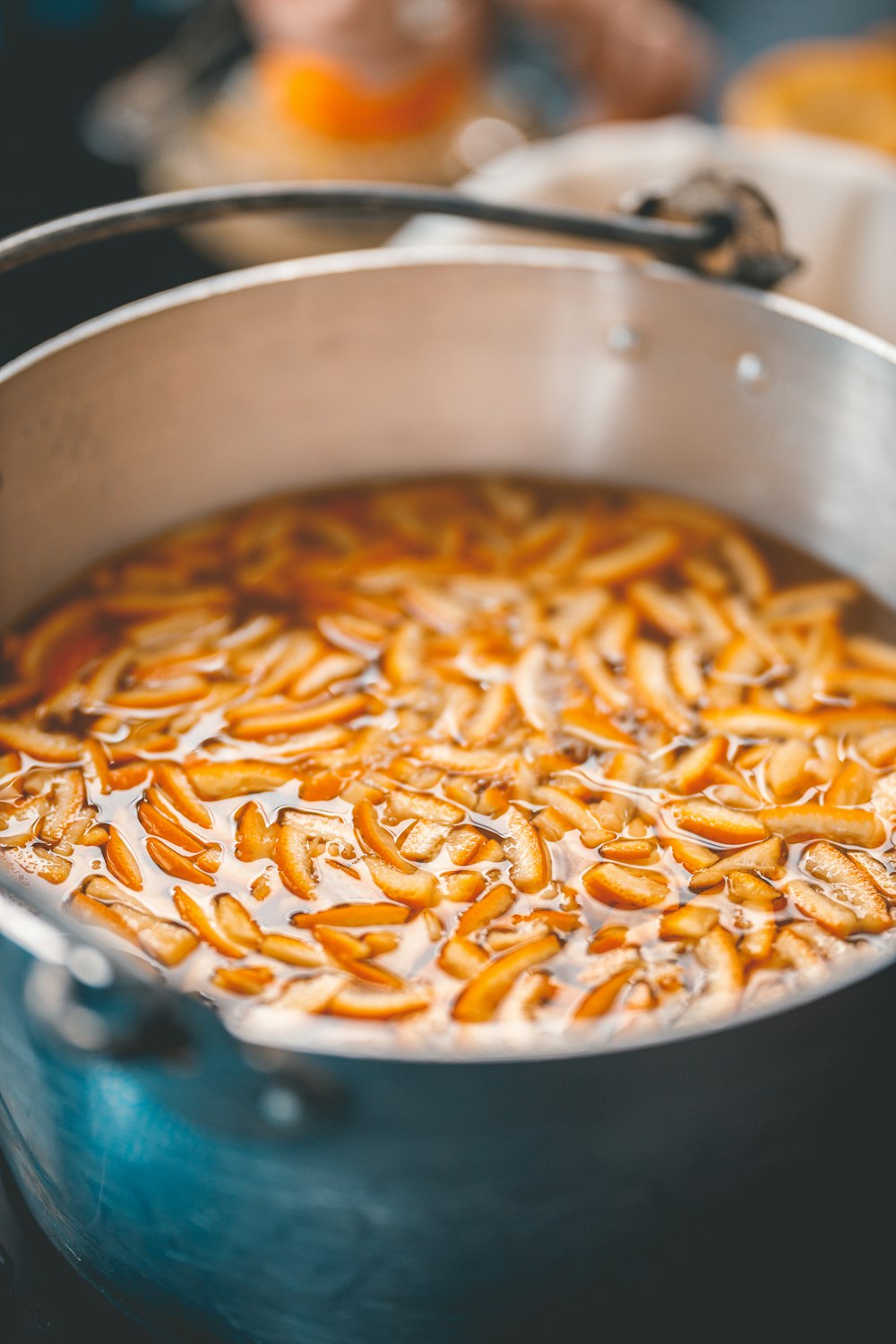 a pot filled with food sitting on top of a stove