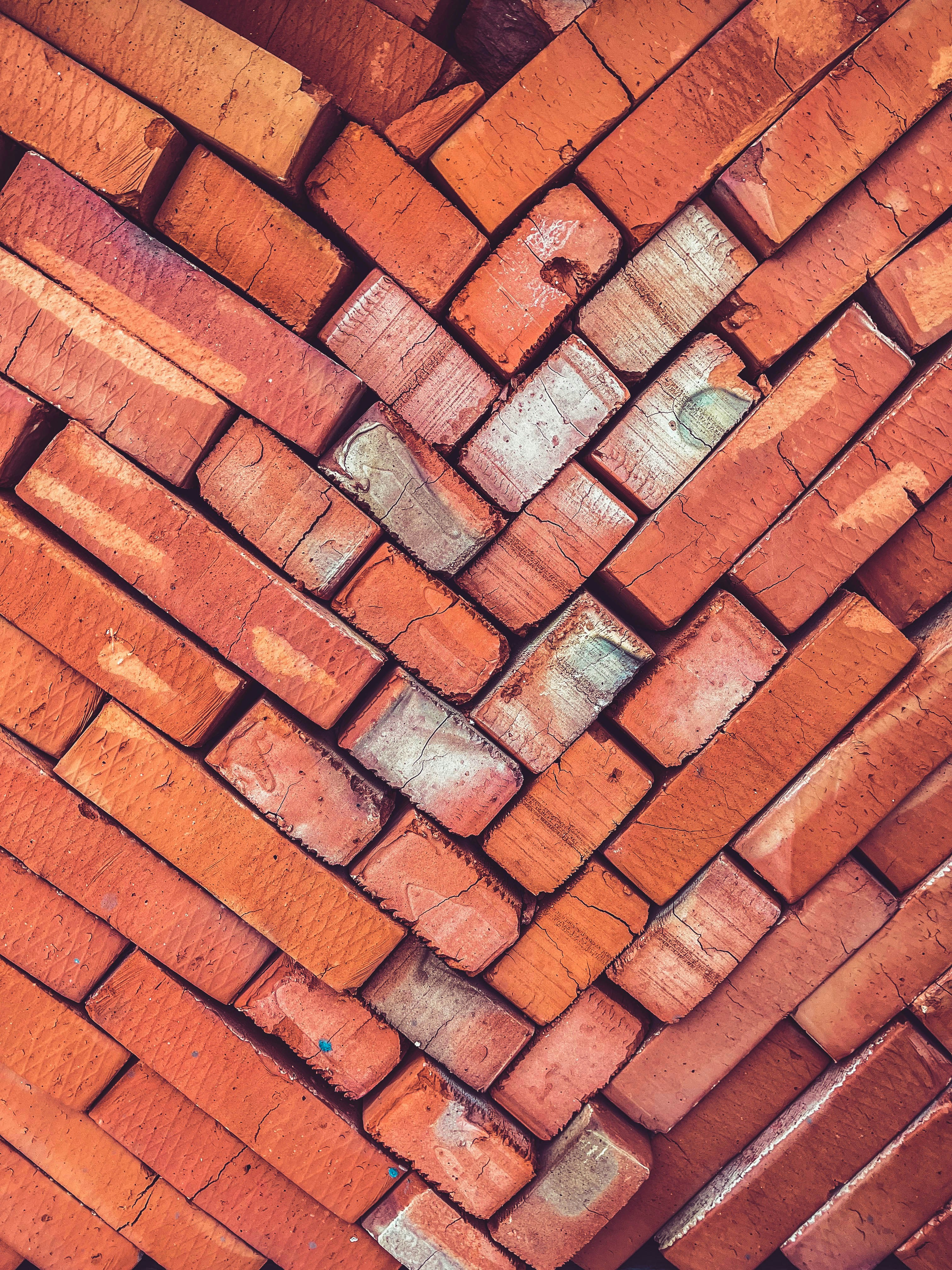 A close up of a brick wall made of bricks photo Free Brick Image on
