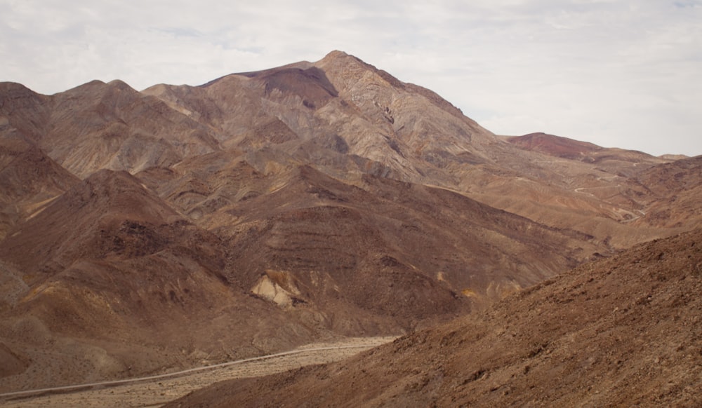 a view of a mountain range in the desert
